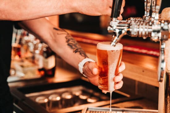 Carlton Draught being poured from a tap